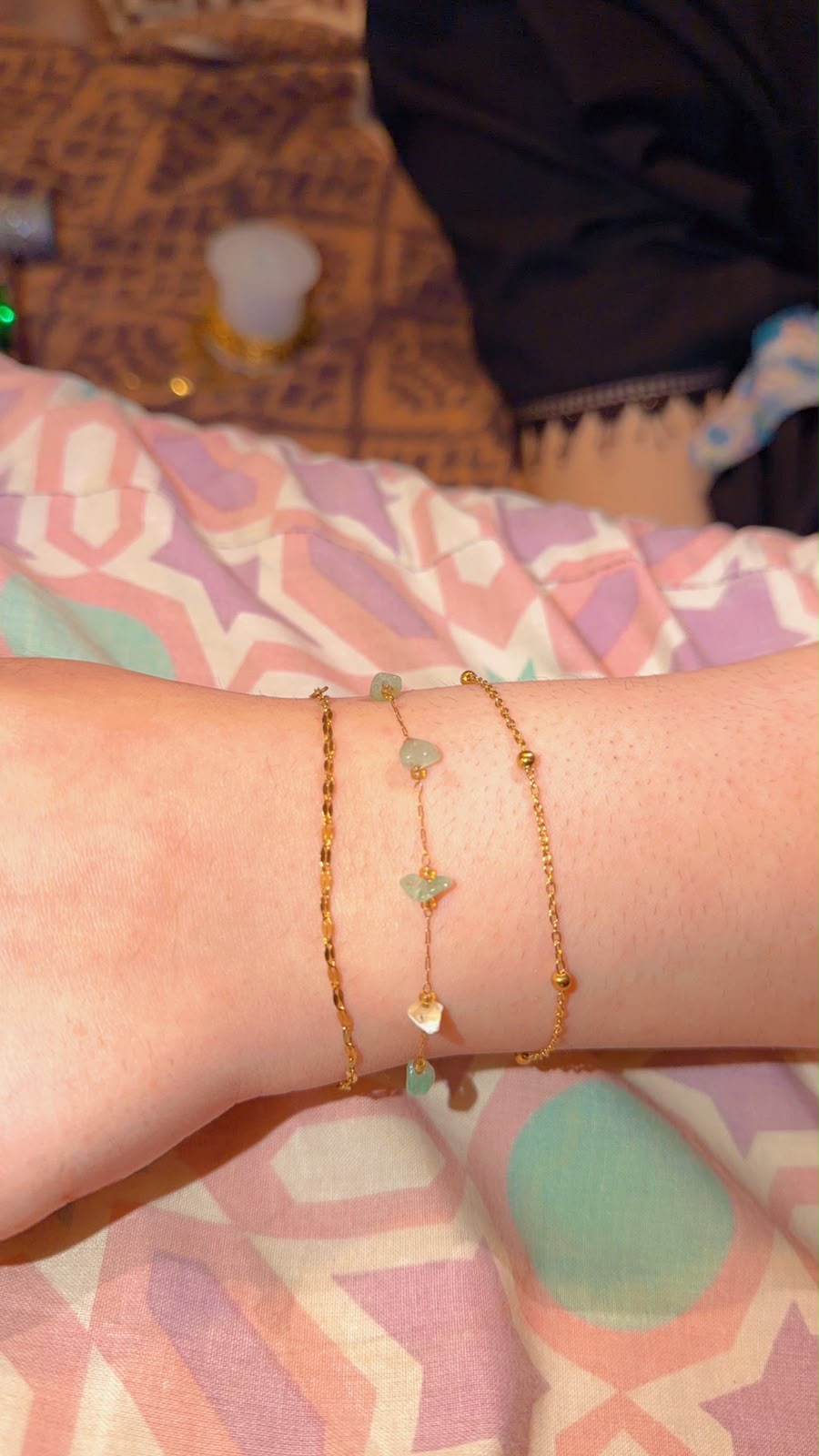Gold stacked bracelets by Loops by Bea